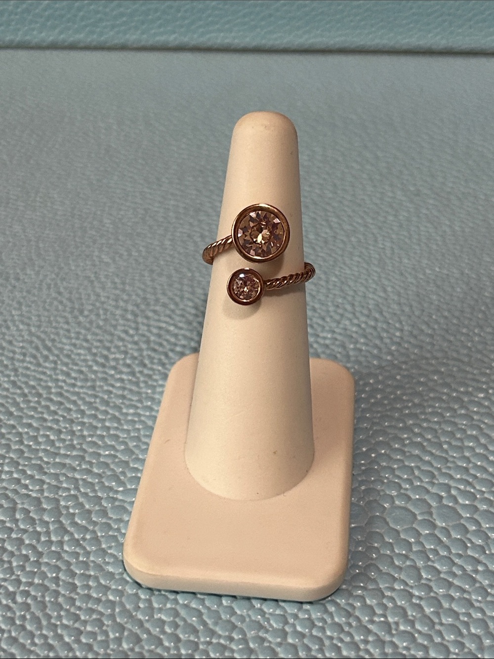 Touchstone Crystal by Swarovski curled up ring blush size 6
